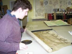 Student looking at parchment