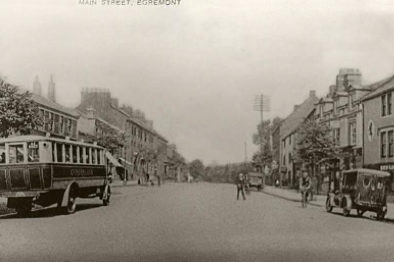 Old vehicles on the road through Egremont